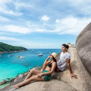 Sailing rock view point with a couple on the Similan Island