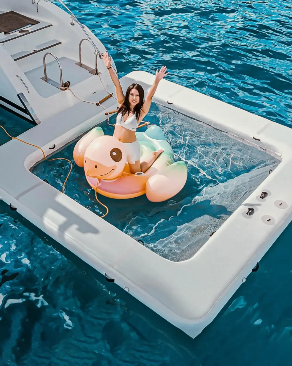 Floating ocean swimming pool on Rhapsody Catamaran Phuket