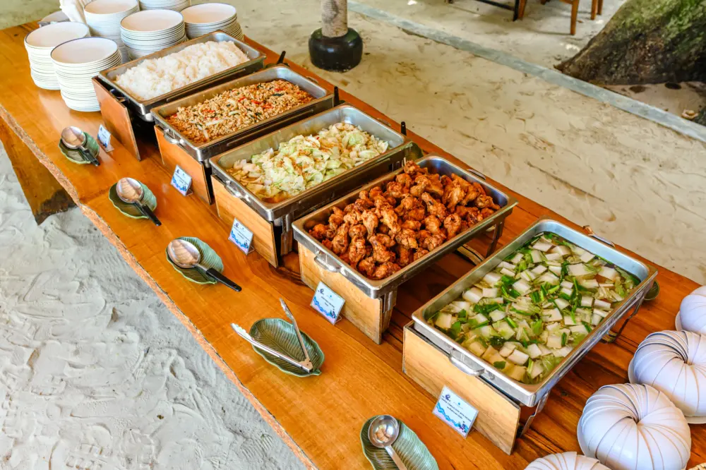 Buffet lunch setup at Banana Beach on Coral Island