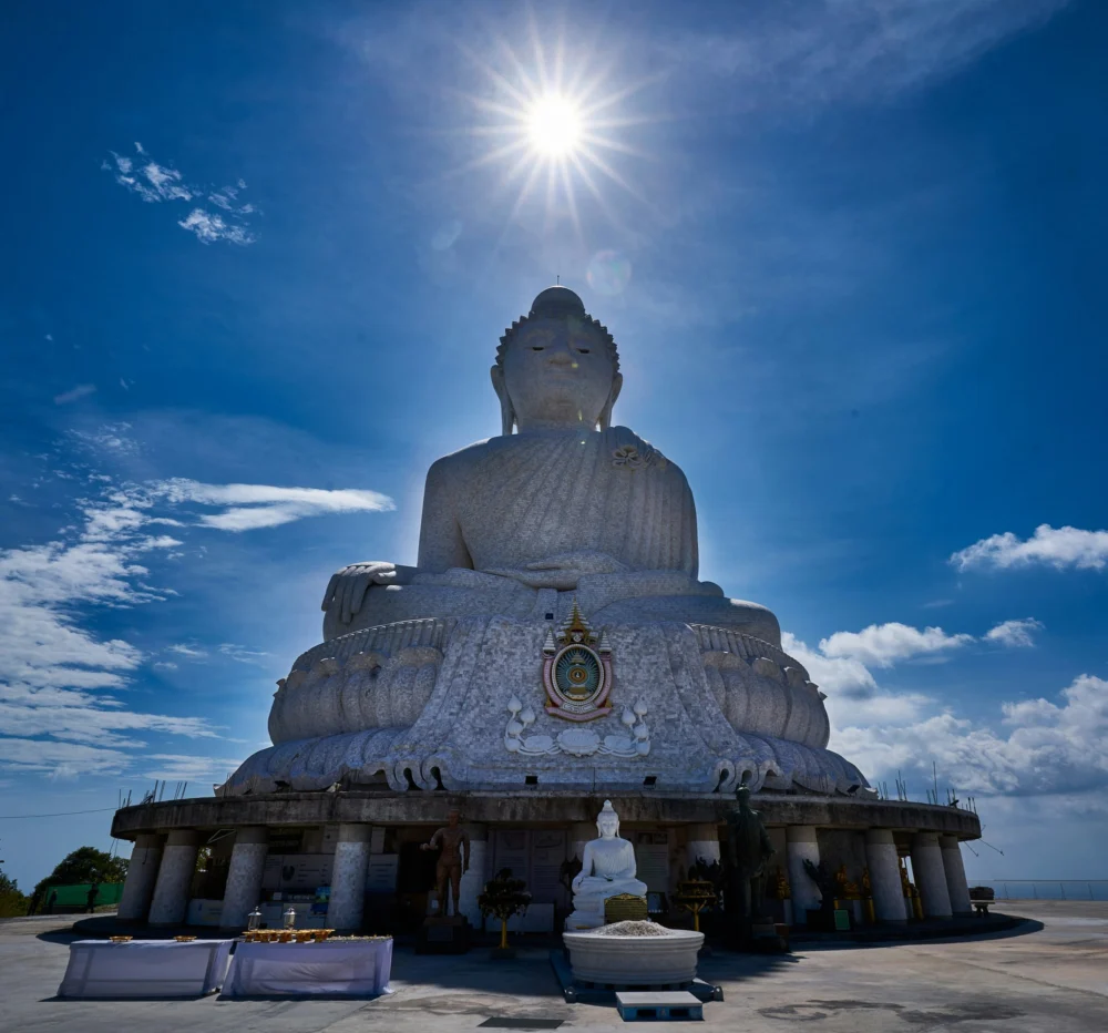 Sunlight above the head of the Big Buddha statue on Nakkerd Hill Phuket