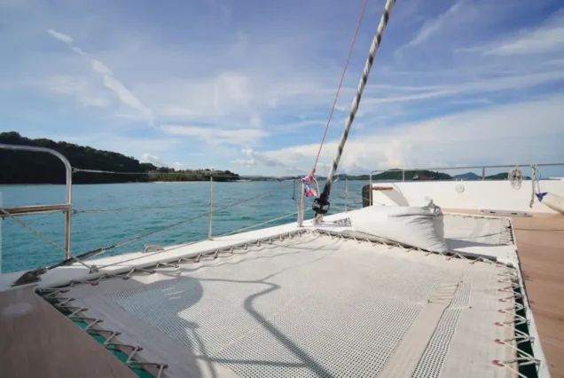 Black Wing Catamaran outdoor trampoline area with sea view