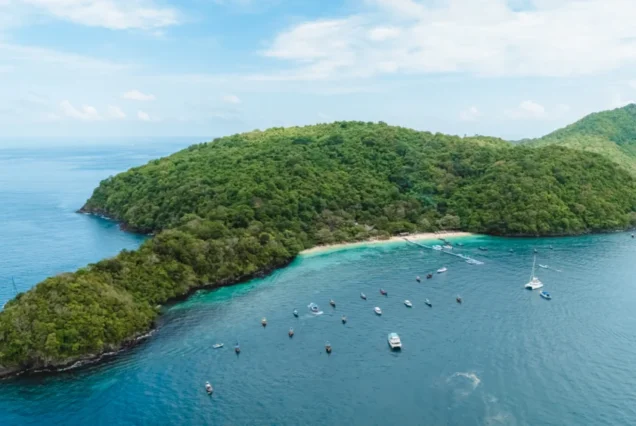 Coral Island Banana Beach aerial view with boat landing