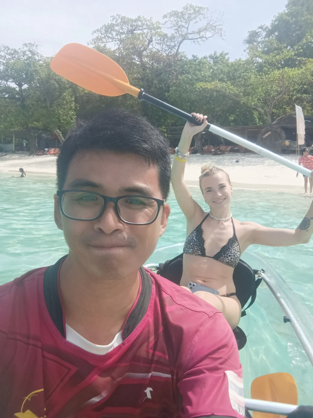 Tour guide sharing a cheerful selfie moment with travelers at Coral Island Phuket