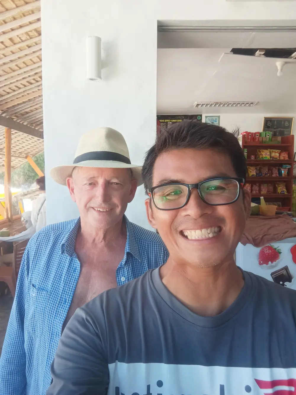Phuket tour guide spending time with a senior traveler at Patok Bay Racha Island
