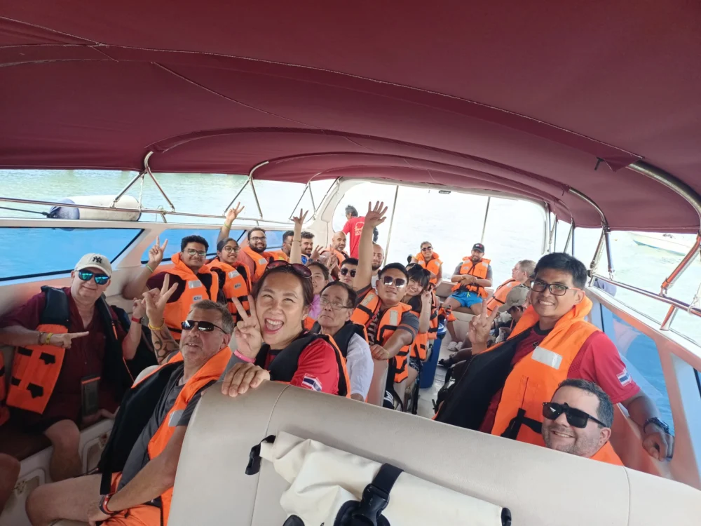 Family group inside a speedboat before traveling to Racha Island Phuket