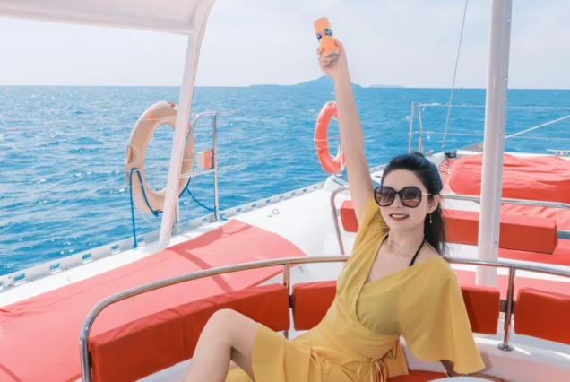 Comfortable sofa and shaded seating area aboard Marvel Catamaran