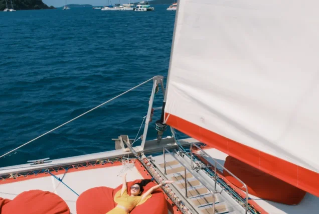 Comfortable sofa and shaded seating area aboard Marvel Catamaran