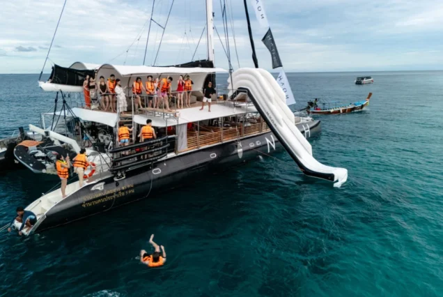 Guests enjoying snorkeling beside Noah Catamaran