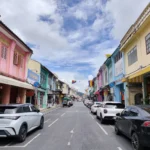 Colorful heritage buildings on Thalang Road in Phuket Old Town for a family city tour