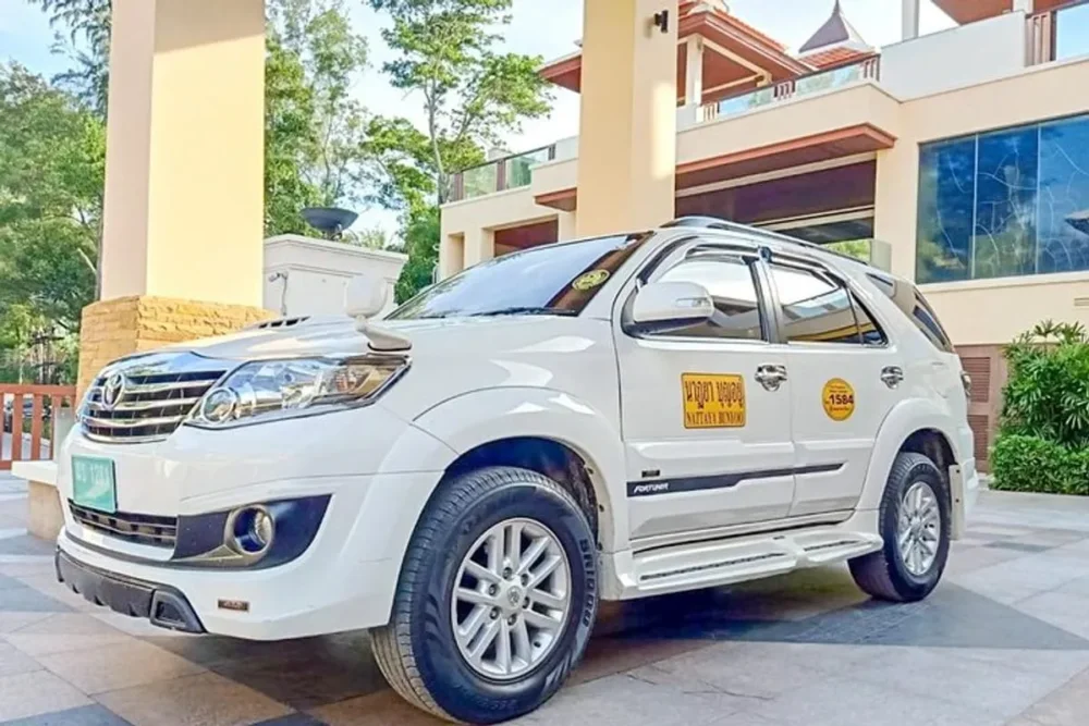 Private hire taxi with green registration plate in Phuket