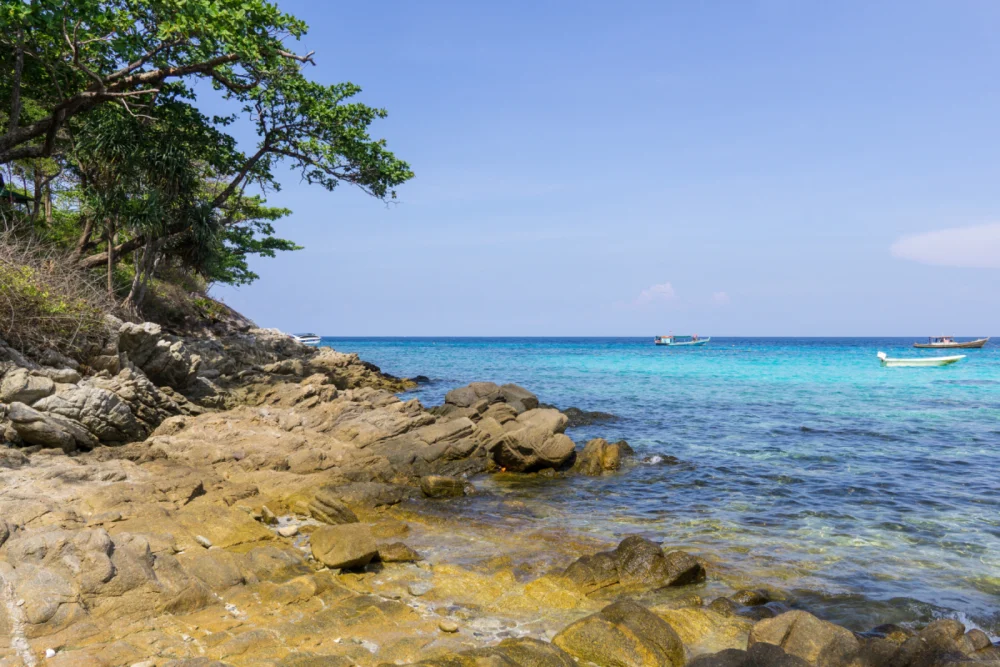 Lah Bay at Racha Island with rocky snorkeling area and clear blue sea