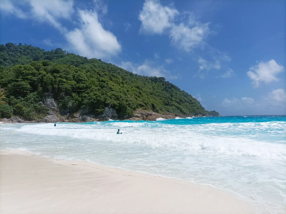 Racha Island Patok Bay with soft waves and clear water near Phuket