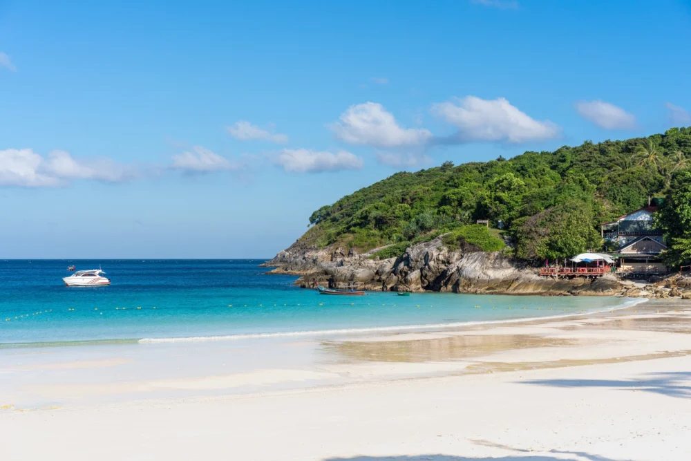 Peaceful water and boat landing at Patok Beach Racha Island