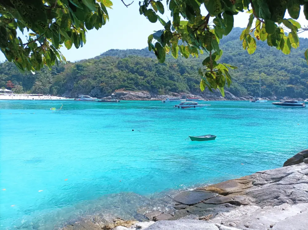 Scenic view across Patok Bay and clear blue water at Racha Island