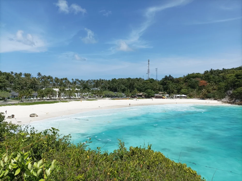 Racha Island Patok Bay with clear water and soft waves near Phuket