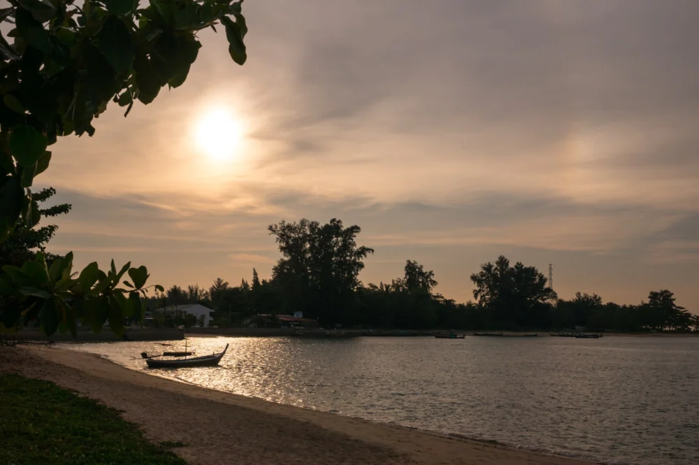 Golden evening light over the sea at Sarasin Bridge Phuket