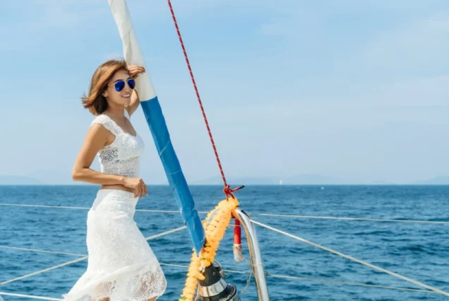 Guest standing on the deck of Silver Catamaran