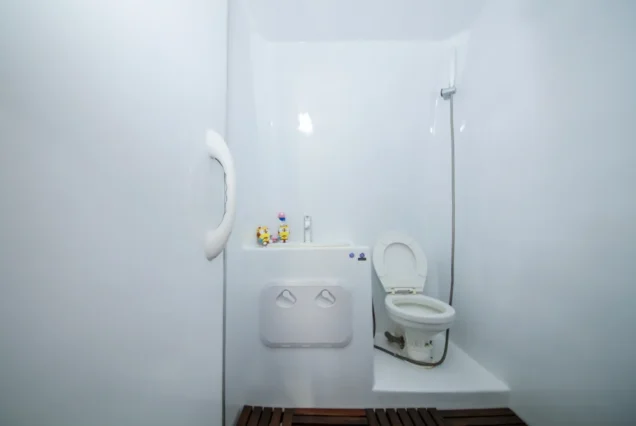 Clean white toilet area on Silver Catamaran