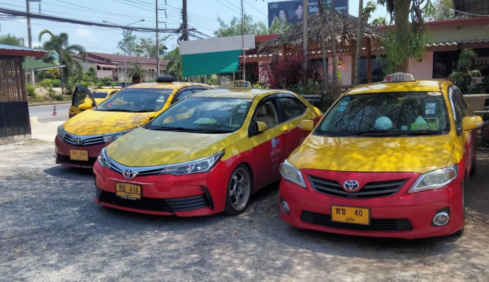 Phuket red-and-yellow taxi available for local journeys