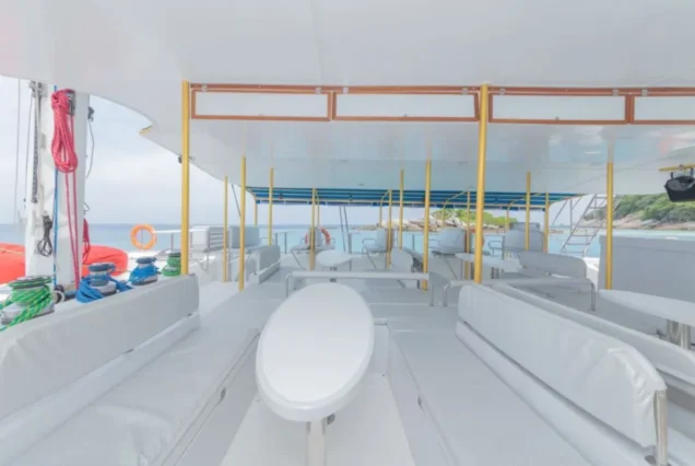 Spacious shaded interior of Aquaman Catamaran