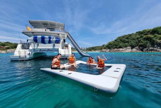 Floating sea pool beside Indigo Catamaran Yacht