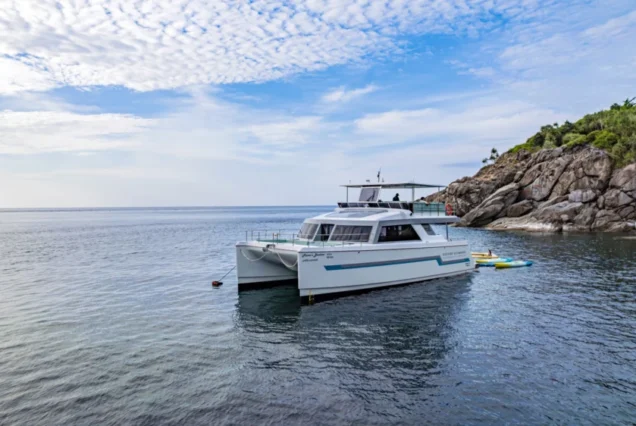 Guest enjoying the floating pool beside the yacht