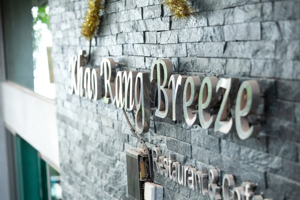 Entrance sign for Khao Rang Breeze restaurant in Phuket