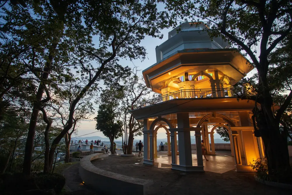 Illuminated Khao Rang viewpoint tower after sunset