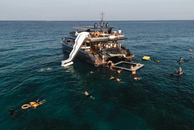Guests enjoying clear-water snorkelling from Noah luxury yacht