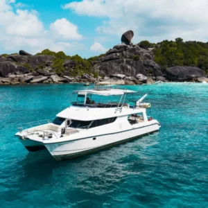 Flash No.7 luxury catamaran yacht in a clear Similan Island bay