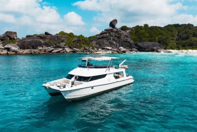 Flash No.7 luxury catamaran yacht in a clear Similan Island bay