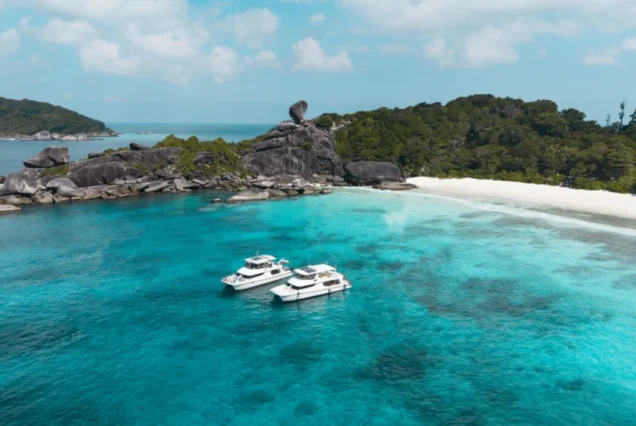 Flash No.7 catamaran yachts in a turquoise island bay