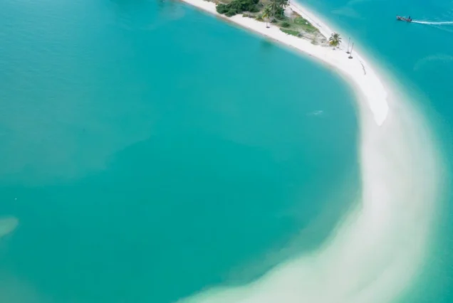 Laem Haad’s narrow sandbar reaching into blue-green water