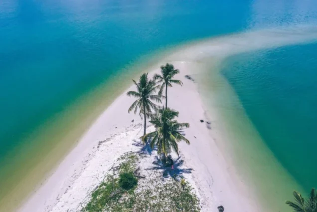 Overhead view of Laem Haad’s white sand and palms