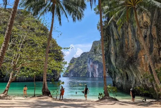 Palm-fringed beach and limestone scenery at Lao Lading