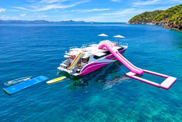 Floating play area and water activities beside Seastar Rainbow Catamaran