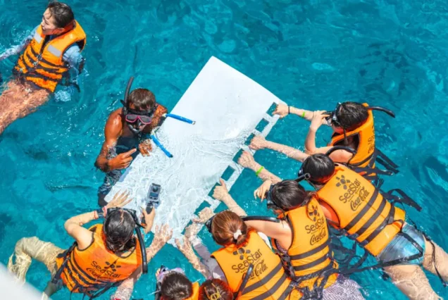 Guests wearing life jackets during a Similan snorkeling session