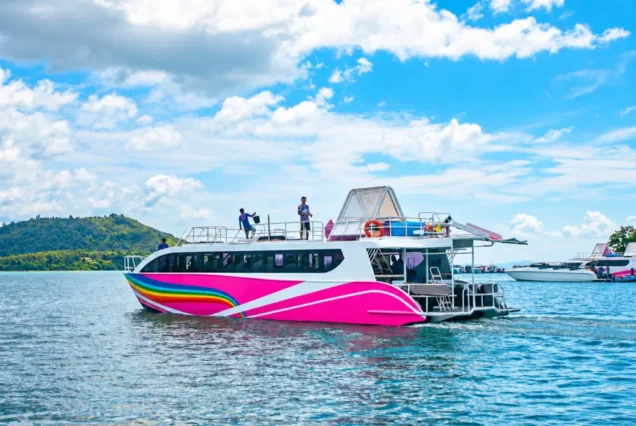 Seastar Rainbow double-deck catamaran on turquoise water near Phuket