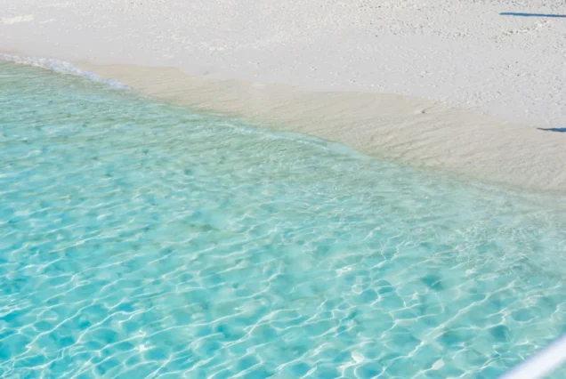 Clear shallow water along a Similan beach