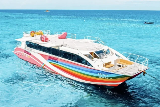 Seastar Rainbow catamaran floating on clear blue sea