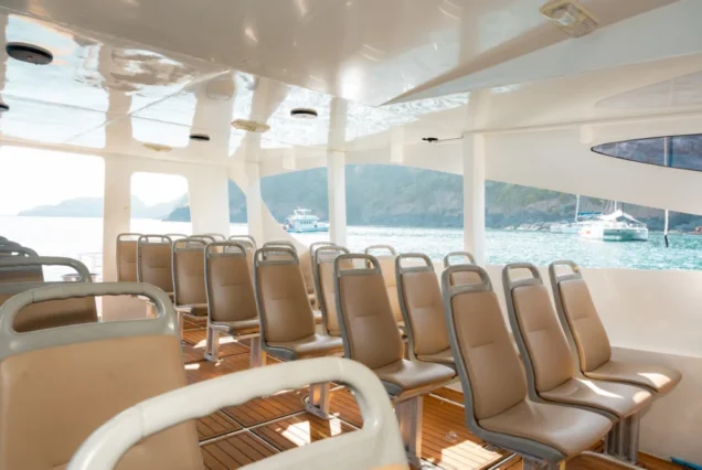 Individual cabin seats and wooden floor aboard Taurus