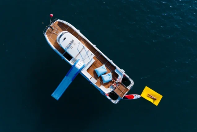 Aerial view of Taurus with its waterslide, floating mat and paddleboard